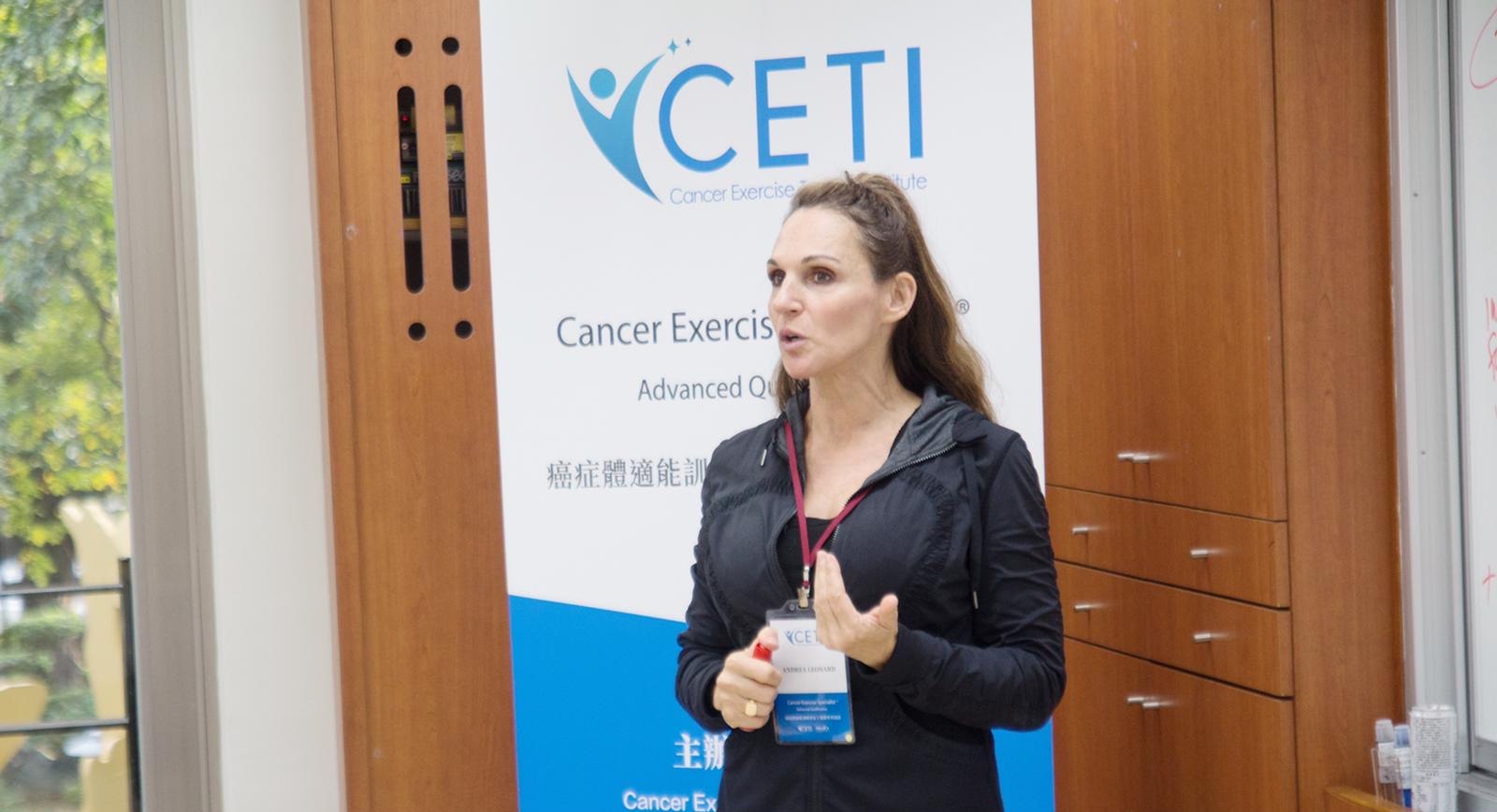 Andrea Leonard teaching a live CETI course to a full room